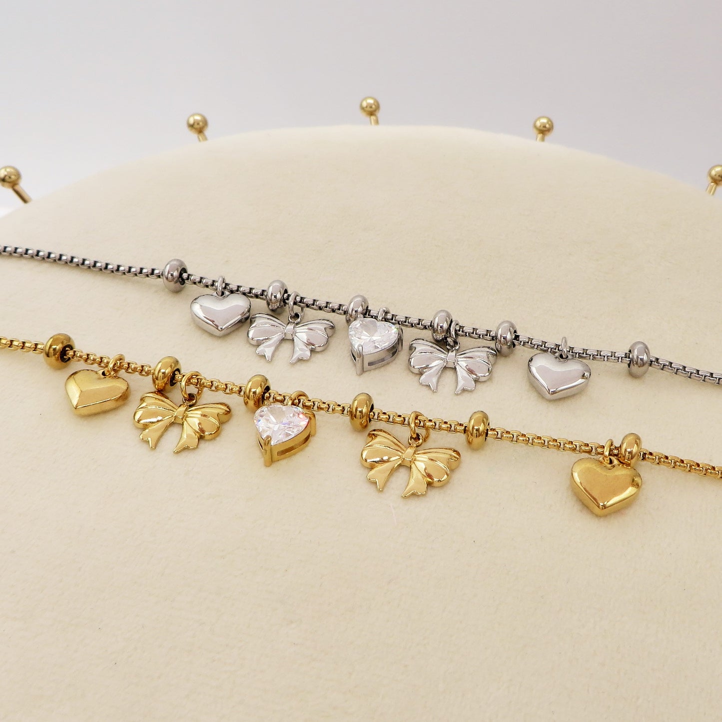 WALDORF - Bracciale con fiocchi e cuori pendenti bombe' ACCIAIO INOSSIDABILE