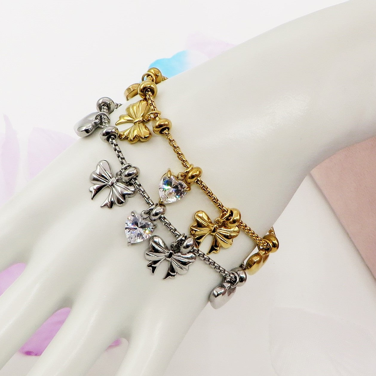 WALDORF - Bracciale con fiocchi e cuori pendenti bombe' ACCIAIO INOSSIDABILE