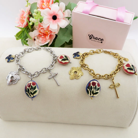 CAROL Bracciale con charms fiori vintage, farfalle e cuori - ACCIAIO INOSSIDABILE