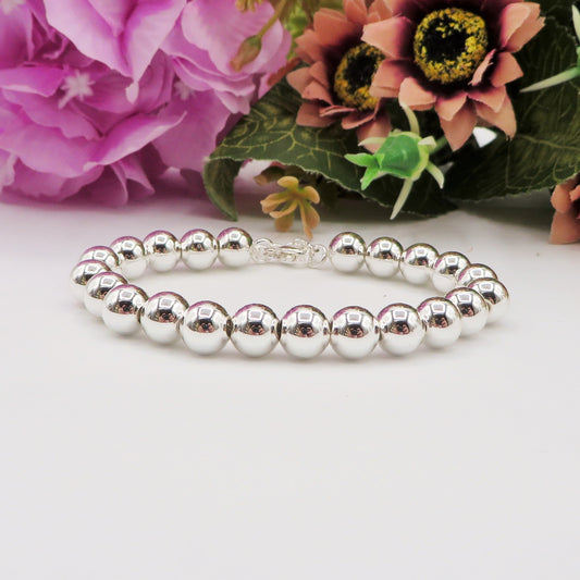Bracciale PALLINI 8mm bagnato ARGENTO ~ Bracciale UNISEX in ACCIAIO