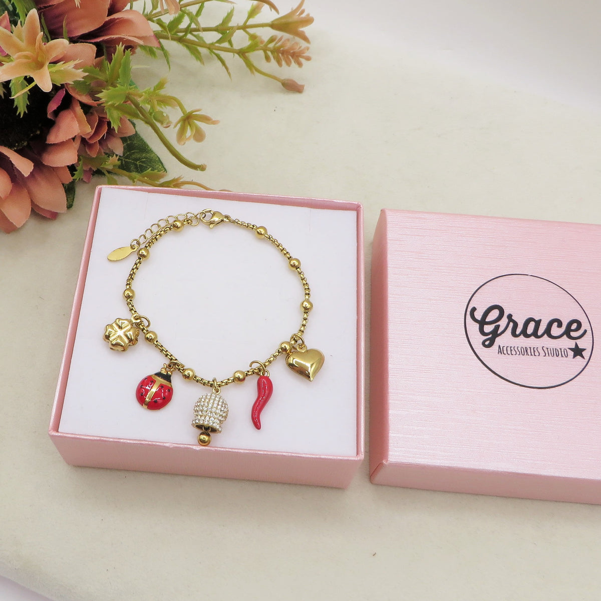 TINKERBELL SHINE LUCKY - Bracciale con campanella zirconata, corno, cuùuore bombè con sonagli, coccinella, quadrifoglio IN ACCIAIO INOSSIDABILE + cubic zirconia