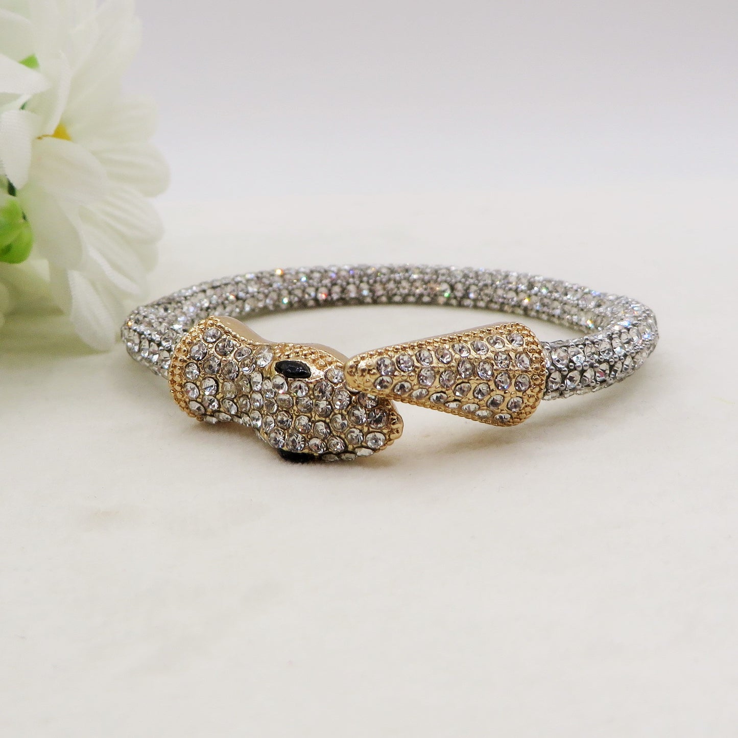 KAA BIG HEAD~Bracciale snodato a serpente con cubic zirconia