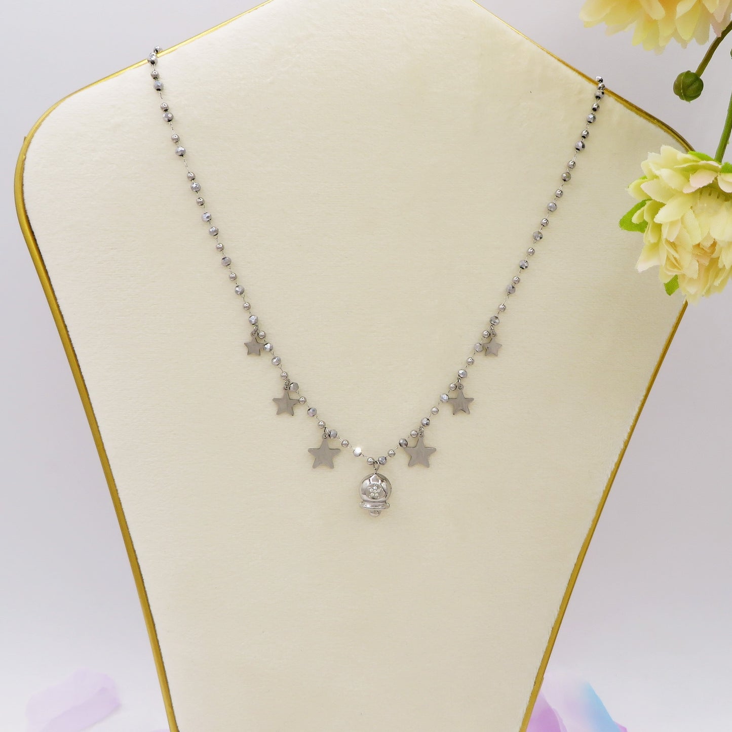 MIRABELLE - ACCIAIO INOSSIDABILE- Collana con campanella e stelline + cubic zirconia