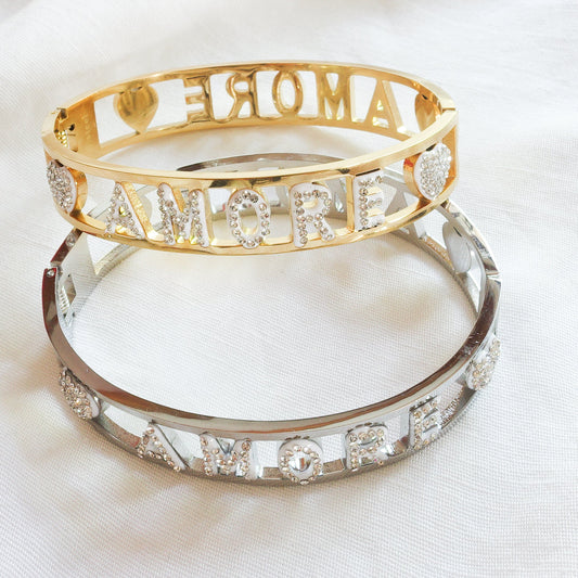 AMORE ~ Bracciale manetta in ACCIAIO INOSSIDABILE con cubic zirconia