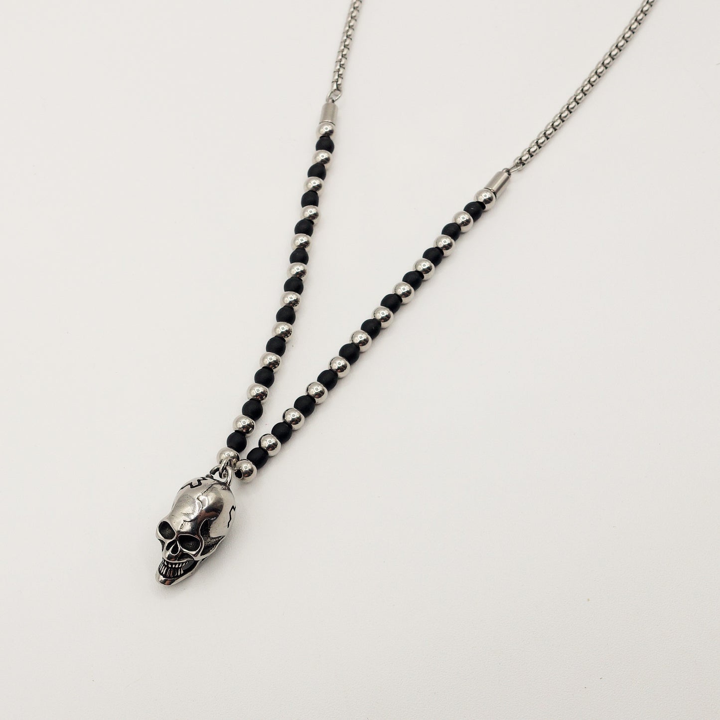 Collana pallini bruniti pendente SKULL uomo ACCIAIO