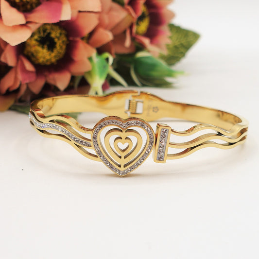 DORIS BRACCIALE a MANETTA ~ acciaio inossidabile - con cuore e zirconi