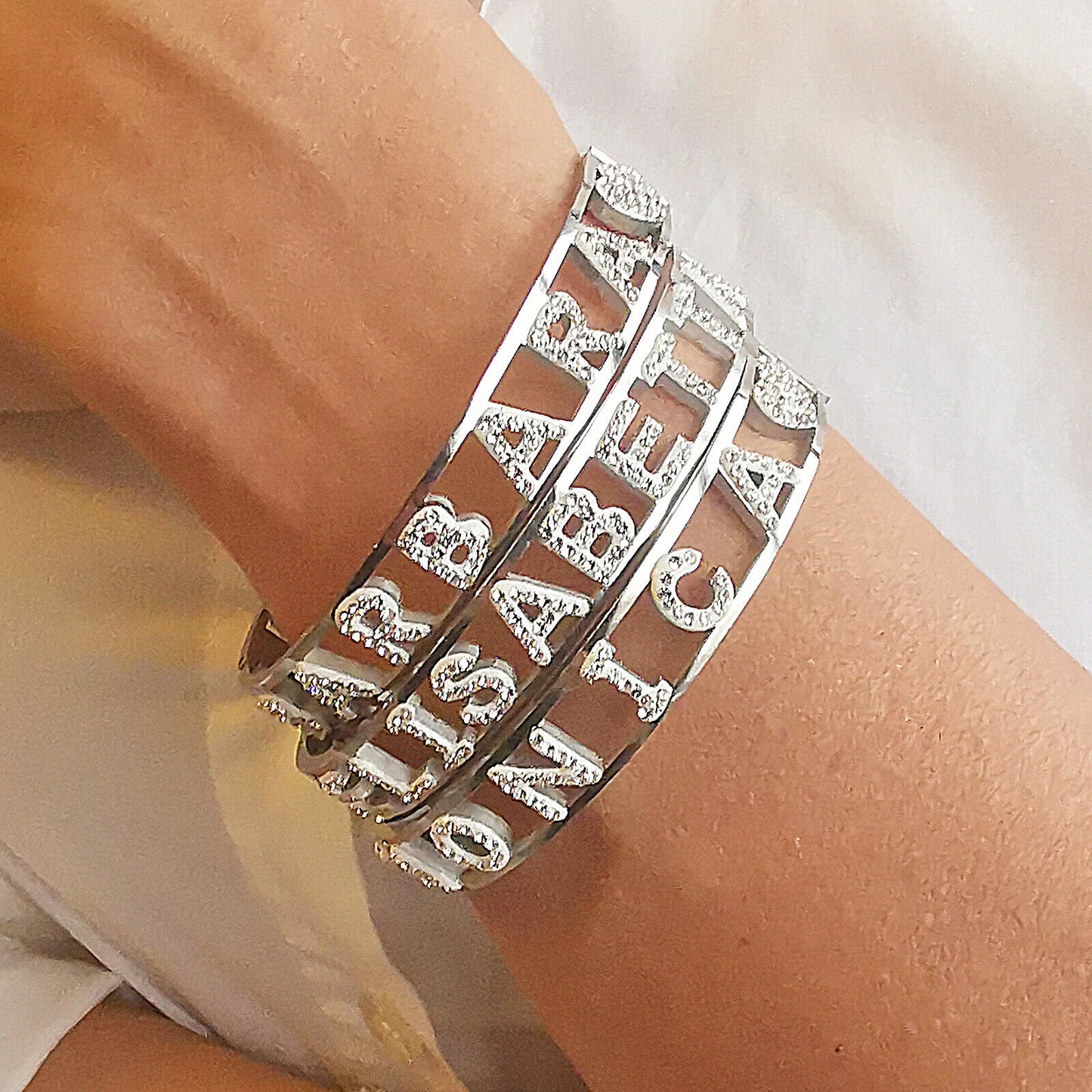 "IL MIO NOME"-BRACCIALE A MANETTA IN ACCIAIO INOSSIDABILE E ZIRCONI
