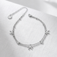 WALDORF ~ Cavigliera con fiocchi in ACCIAIO INOSSIDABILE 316L + cubic zirconia