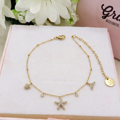 ARUBA ~ Cavigliera con charms marini in ACCIAIO INOSSIDABILE 316L + cubic zirconia tartaruga, delfino, stella marina