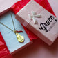 SACRED LUCKY ~ Collana charms cuore sacro e cornetto - ACCIAIO  inossidabile