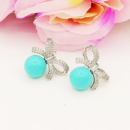 CALLA Turquoise ~ Orecchini bottone con  fiocco zirconato