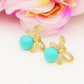 CALLA Turquoise ~ Orecchini bottone con  fiocco zirconato