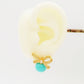 CALLA Turquoise ~ Orecchini bottone con  fiocco zirconato