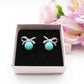 CALLA Turquoise ~ Orecchini bottone con  fiocco zirconato