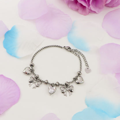 WALDORF - Bracciale con fiocchi e cuori pendenti bombe' ACCIAIO INOSSIDABILE