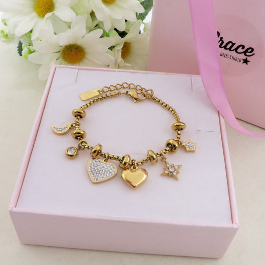 MOON & STAR - Bracciale con luna stelle  e cuori pendenti bombe' ACCIAIO INOSSIDABILE e Cubic Zirconia