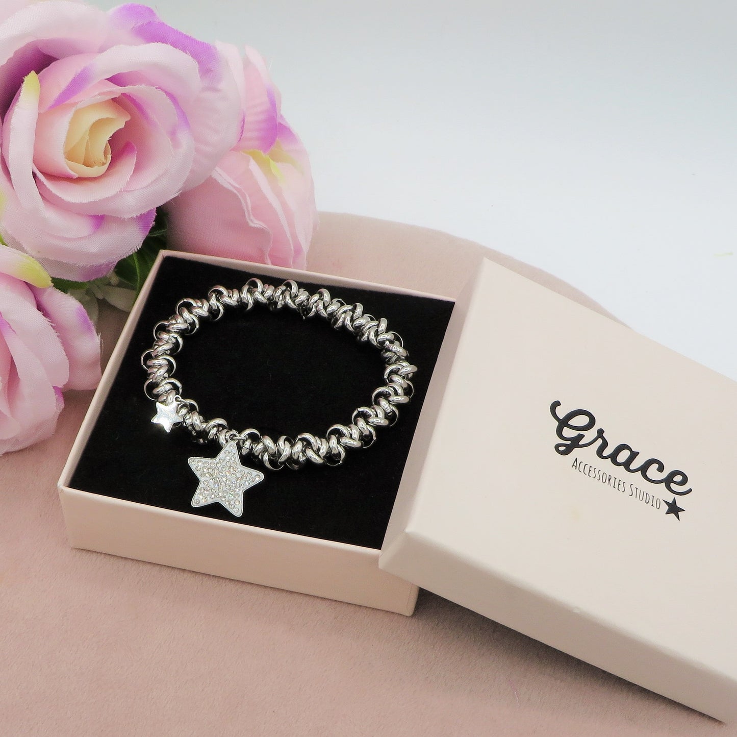 ARDEN - Bracciale elasticizzato nodini cuore e stella in acciaio inossidabile
