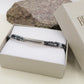 ARES Bracciale uomo  Targhetta con greche e cubetti in ematite -  ACCIAIO INOSSIDABILE