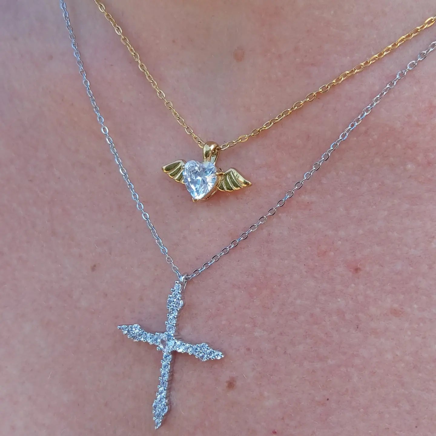ANGEL - ACCIAIO INOSSIDABILE- collana con pendente CUORE con ali in cubic zirconia