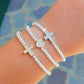 REBECCA CROSS - Bracciale perle con croce zirconata