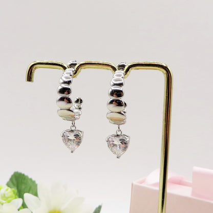 LUCY - ACCIAIO INOSSIDABILE - Paio Orecchini hoops pendenti in cubic zirconia a forma di cuore