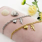 CUPID- Bracciale con angelo cupido e cuore bombe' ACCIAIO INOSSIDABILE