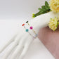 DAISY ~ ACCIAIO INOSSIDABILE ~ Bracciale con fiori e cristalli