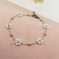 DAISY ~ ACCIAIO INOSSIDABILE ~ Bracciale con fiori e cristalli