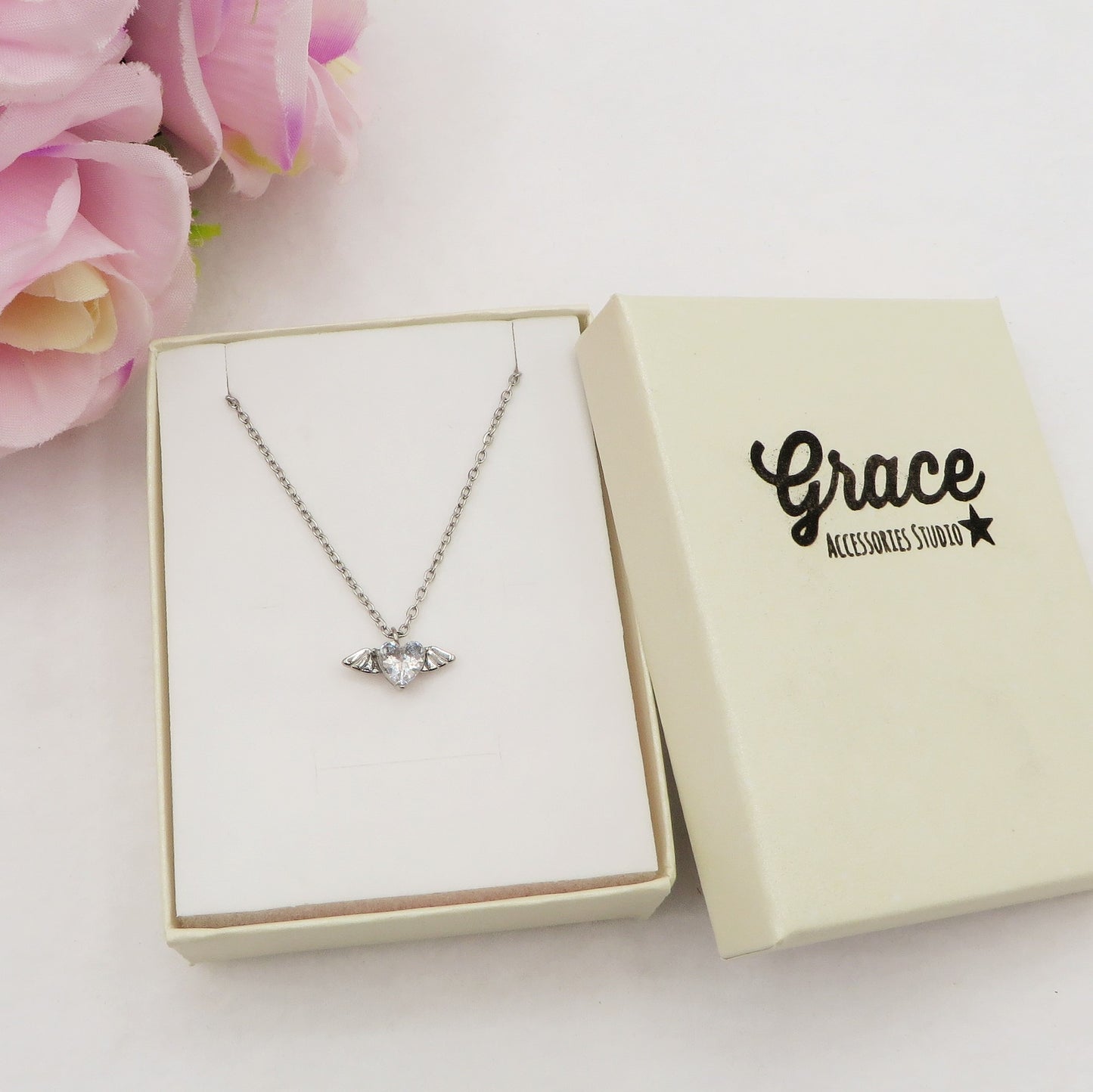 ANGEL small - ACCIAIO INOSSIDABILE- collana con pendente CUORE con ali in cubic zirconia