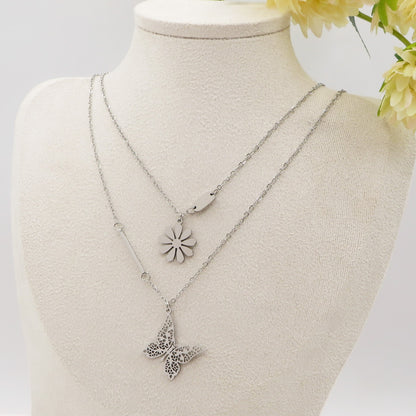 BLOOM ~ Collana doppia in ACCIAIO INOSSIDABILE doppia con margherita e farfalla