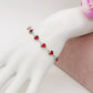 JANE ~ Bracciale ACCIAIO INOSSIDABILE con cuoricini in cristallo