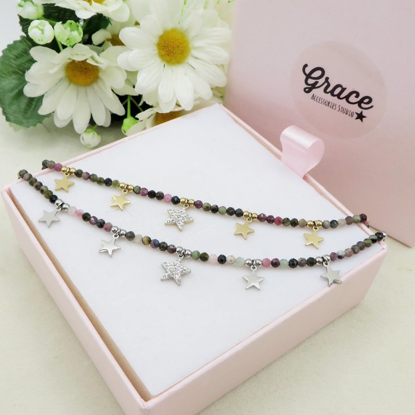 ROXY ~ Bracciale ACCIAIO INOSSIDABILE con cristalli e ciondoli stelline in cubic zirconia