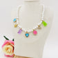 FANTASY - Base Gold - Collana perle e charms rainbow