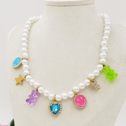 FANTASY - Base Gold - Collana perle e charms rainbow