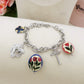 CAROL  Bracciale con charms fiori vintage, farfalle e cuori - ACCIAIO INOSSIDABILE