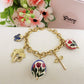 CAROL  Bracciale con charms fiori vintage, farfalle e cuori - ACCIAIO INOSSIDABILE