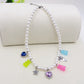 FANTASY - Base silver - Collana perle e charms rainbow