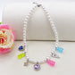 FANTASY - Base silver - Collana perle e charms rainbow