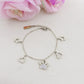 TARA ~ Bracciale in ACCIAIO inossidabile con pendenti ZAMPA cuori e stelle in cubic zirconia (copia)