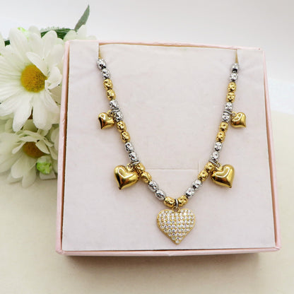 Lumière - Collana girocollo con cuori bombè in cubic zirconia IN ACCIAIO INOSSIDABILE chiamangeli