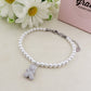 TEDDY CRYSTAL PEARLS - Bracciale perle con orsetto zirconato