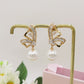 MARIPOSA PEARLS ~ Orecchini bottone con farfalla zirconata e perla