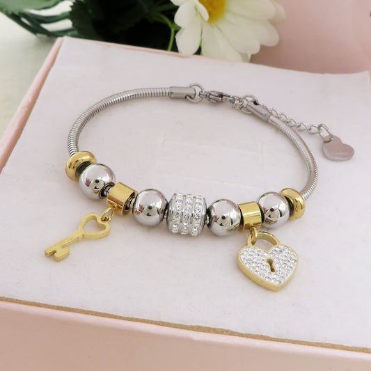 FOREVER LOVE ~ ACCIAIO INOSSIDABILE - bracciale con cuore lucchetto charms in Cubic Zirconia rotondi