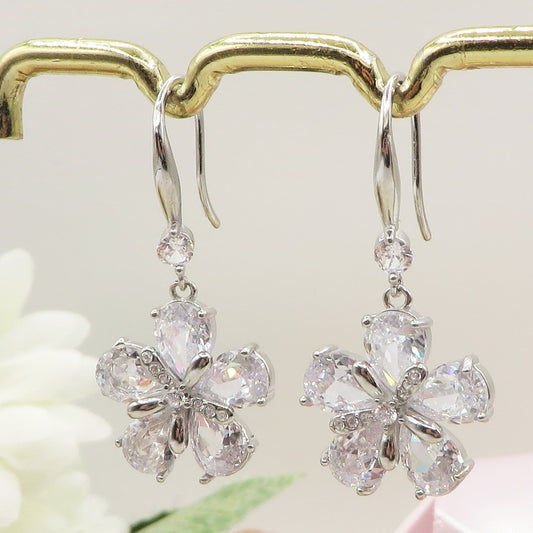 DAISY LUXE - Orecchini in ACCIAIO INOSSIDABILE a monachella con fiori in cubic zirconia