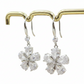 DAISY LUXE - Orecchini in ACCIAIO INOSSIDABILE a monachella con fiori in cubic zirconia