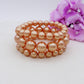 TRIPLE MAXI PEARLS - Bracciale triplo in maxi perle elasticizzato