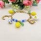 KALIMERA BRACELET  - ACCIAIO inossidabile - Bracciale catena charms frutta LIMONI, SOLE, LUNA, MAIOLICA