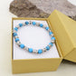 Bracciale unisex elasticizzato NODINI ACCIAIO INOSSIDABILE + perle colours