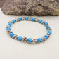 Bracciale unisex elasticizzato NODINI ACCIAIO INOSSIDABILE + perle colours