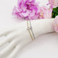 AURORA slim ~ ACCIAIO INOSSIDABILE - Bracciale tennis in cubic zirconia con cuore centrale